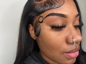 Sculpted brows and lash detail